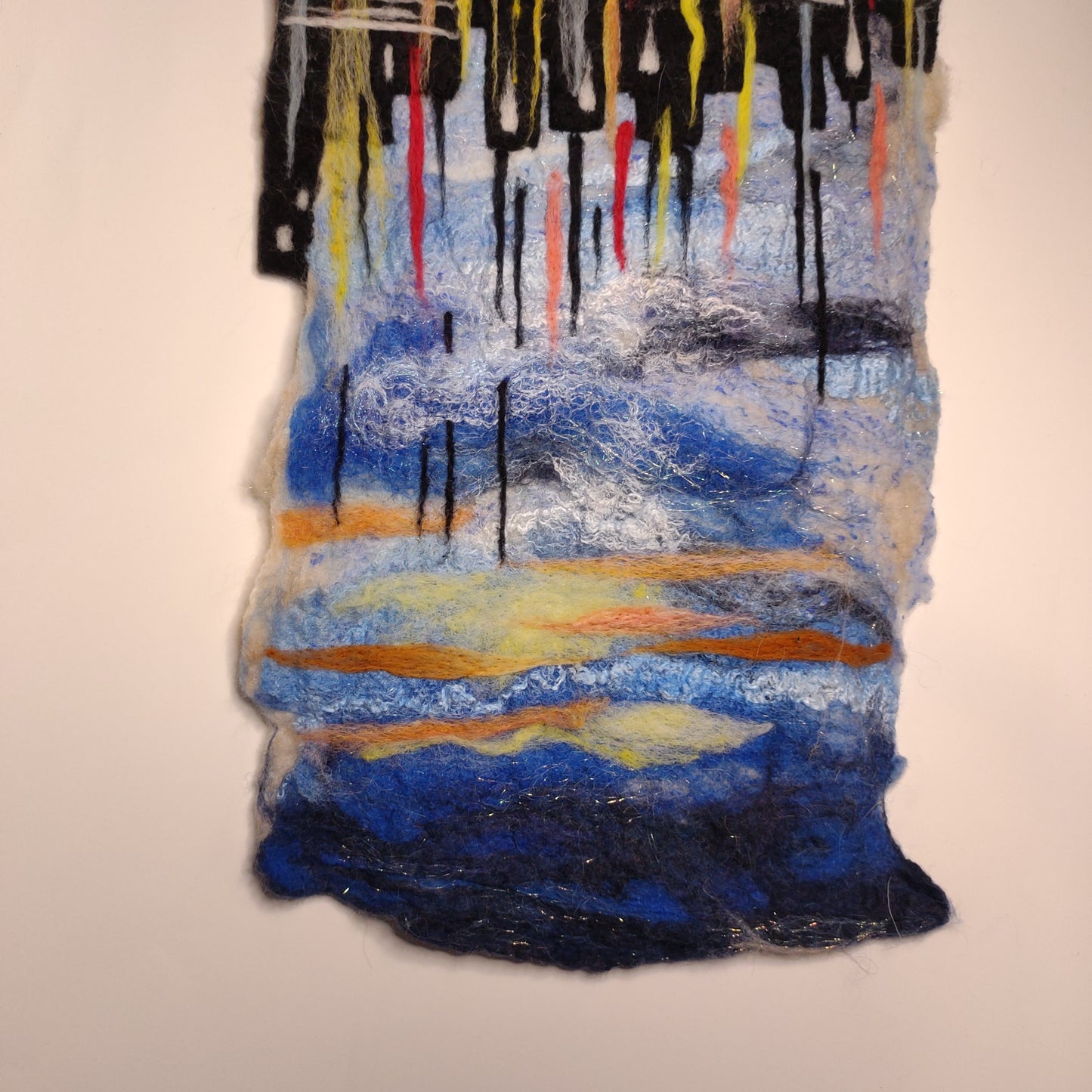 felted wool walll art of a reflected city image in abstract water with reclaimed metal