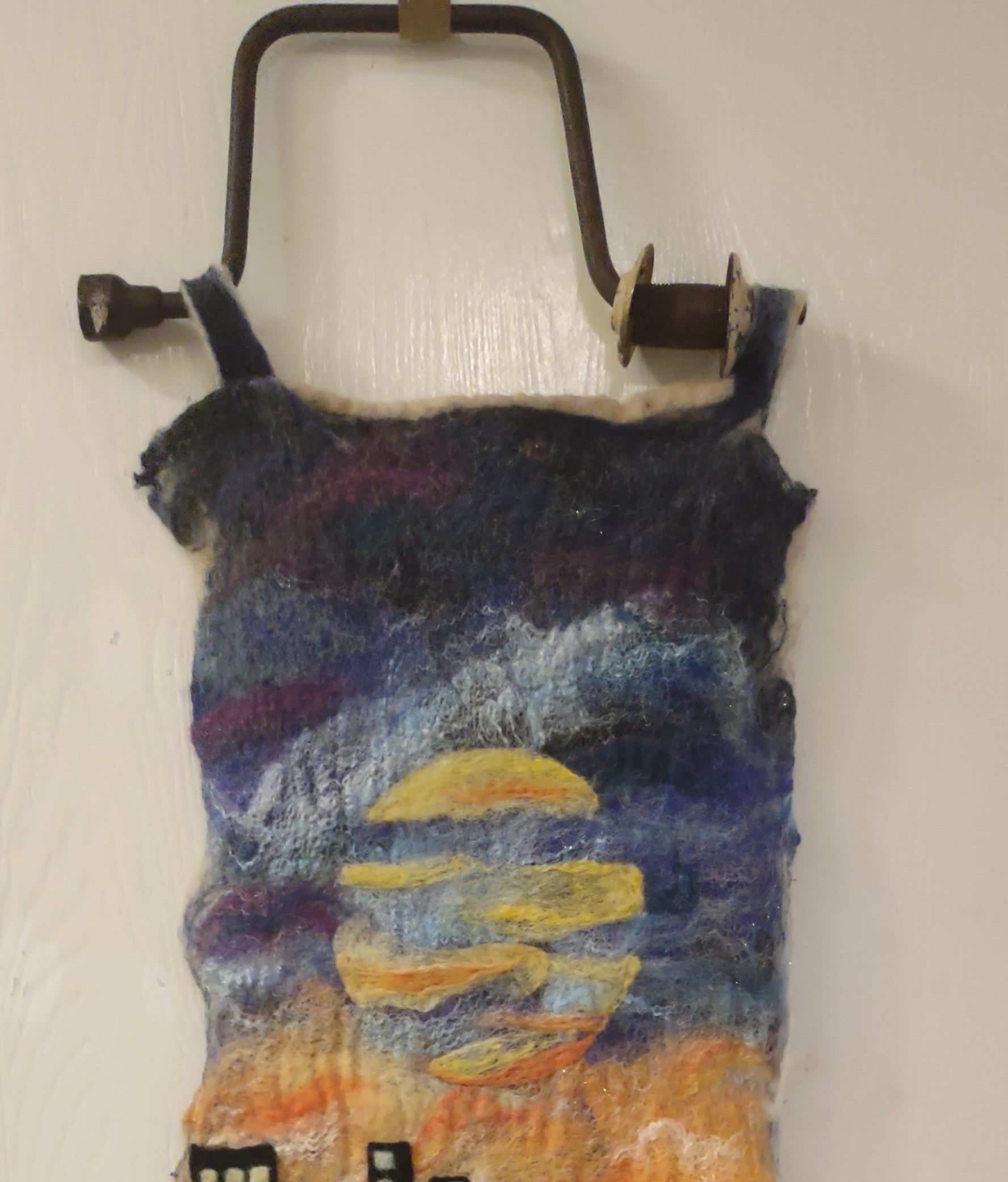 felted wool walll art of a reflected city image in abstract water with reclaimed metal