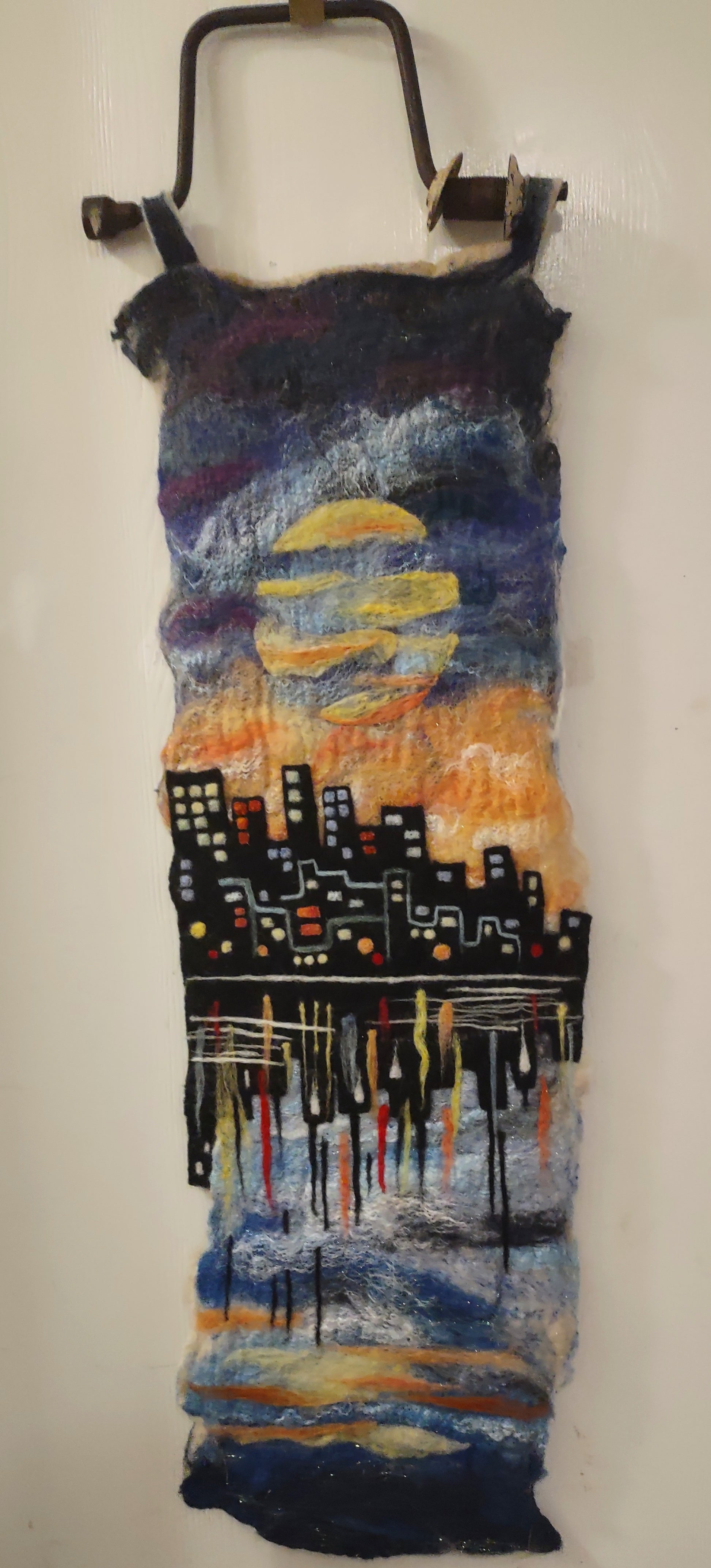 felted wool walll art of a reflected city image in abstract water with reclaimed metal